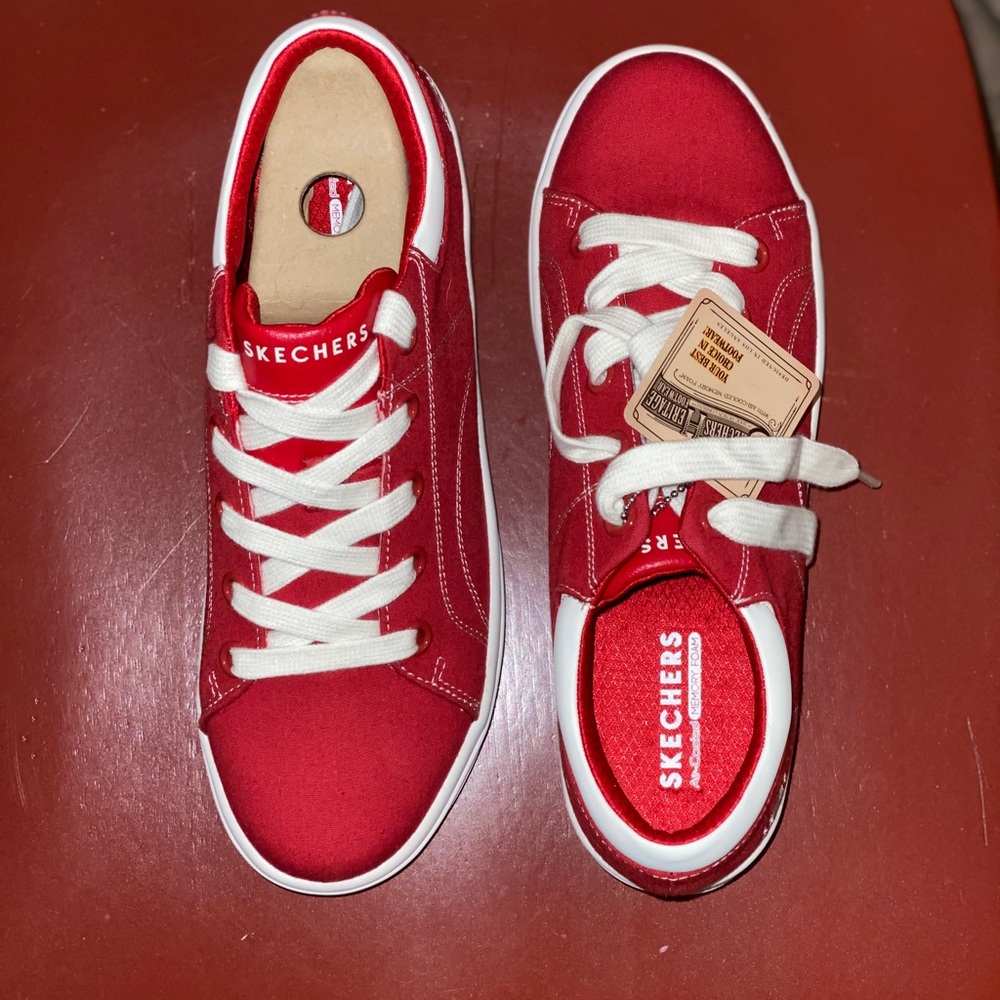 Red Skechers sneakers